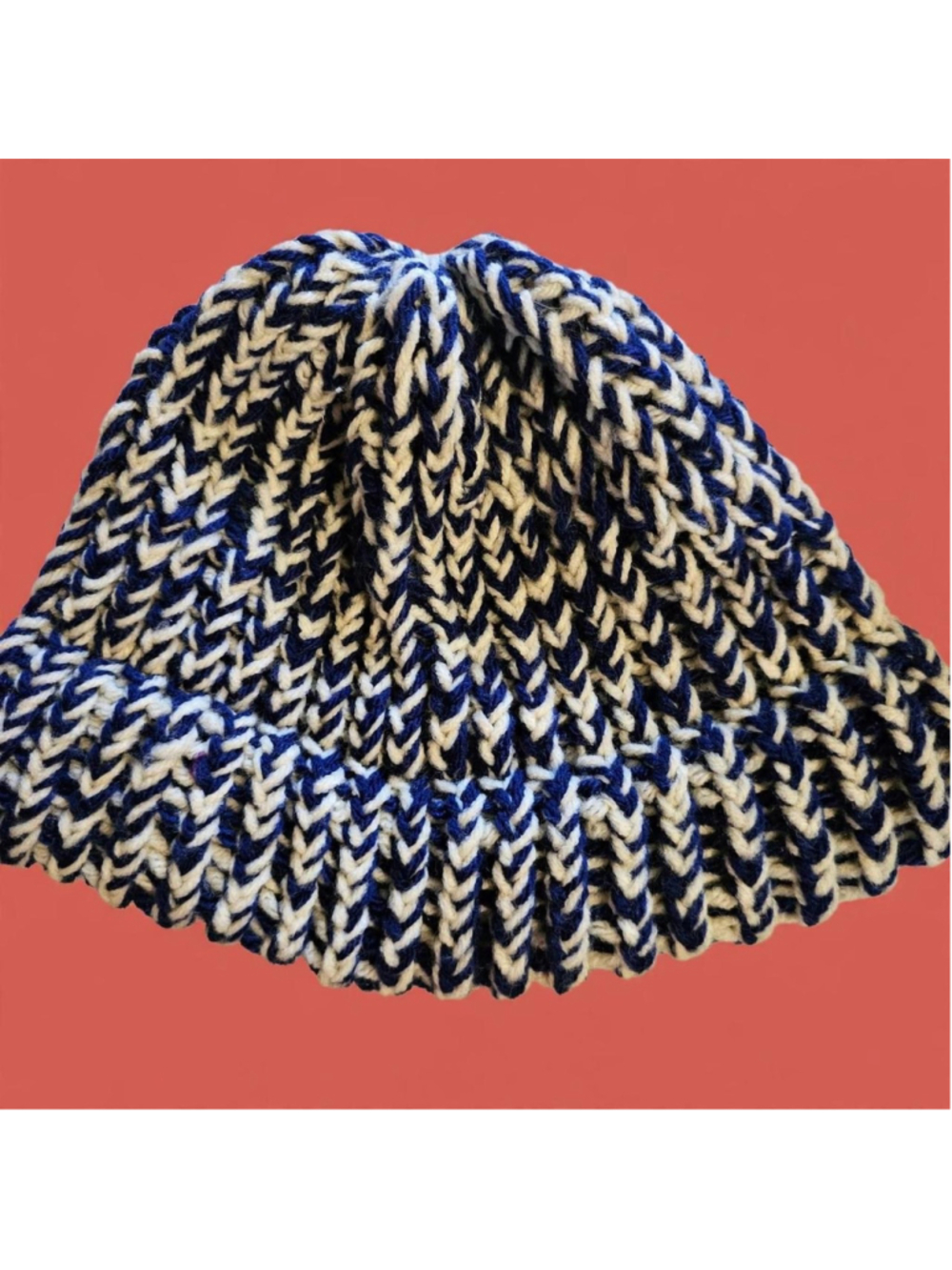 Blue and white knit beanie with ribbed texture #winteraccessories #cozy